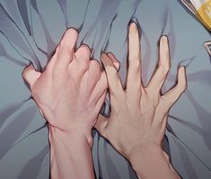 two hands reaching for each other in bed