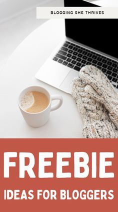 a laptop computer sitting on top of a white table next to a cup of coffee