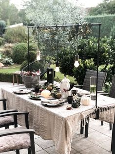 an outdoor dining table set for two