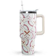 a travel mug with baseballs and bats printed on the side, in front of a white background