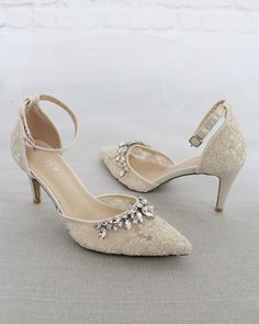 Crochet style pointy toe heels with teardrop rhinestones and detachable ankle strap. Elegance and vintage inspired wear for your special day. DETAILS: HEELS: 3 inches COLORS AVAILABLE: Ivory and White UPPER: Synthetic upper and lining MATERIALS: Mandmade outsole ORIGIN: Imported STYLE NAME: EVA