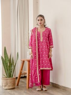 Madhu - Pink Floral Embroidered Cotton Palazzo Kurta Set (Set of 3) By Gulabo Jaipur now available at Trendroots Embroidered Slub Silk Palazzo Set For Navratri, Eid Slub Silk Palazzo Set With Resham Embroidery, Chanderi Sharara With Resham Embroidery, Eid Chanderi Palazzo Set With Gota Work, Embroidered Cotton Silk Palazzo Set With Straight Kurta, Festive Straight Kurta Sharara With Dori Work, Pink Embroidered Palazzo Set In Cotton Silk, Chanderi Palazzo Set With Resham Embroidery For Diwali, Pink Embroidered Cotton Silk Palazzo Set