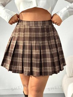 Style:Casual \nType:Pleated \nDetails:Pleated \nDetails:Zipper \nColor:Brown \nPattern Type:Plaid \nWaist Line:High Waist \nLength:Mini \nTemperature:Spring/Fall (18-25℃/63-77℉) \nFit Type:Regular Fit \nFabric:Non-Stretch \nMaterial:Woven Fabric \nComposition:100% Polyester \nCare Instructions:Machine wash or professional dry clean \nSheer:No \n Plus Size Plaid Skirt, Brown Plaid Skirt, Plaid Print Skirt, Printed Pleated Skirt, Plus Size Vintage, Plaid Mini Skirt, Plus Size Skirts, Vintage Plaid, Plaid Skirt