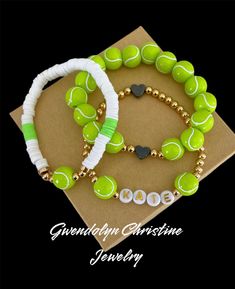 My tennis ball  Stretchy bracelets are fun and fashionable for the the proud tennis mama  or the tennis athlete.  Personalize your stack with your  name and number. Buy 1 bracelet or stack all 3.. bracelets will come as seen in picture unless you specify different colors at checkout in personalization section  My bracelets are custom made with very durable stretchy jewelry cording.  This listing is for 1  or all 3 bracelets made. Please indicate preference at checkout along with personalized inf Tennis Bracelet Ideas, Tennis Craft Ideas, Diy Tennis Bracelet, Tennis Senior Night, Tennis Wristband, Tennis Athlete, Tennis Gift Ideas, Tennis Crafts, Tennis Lifestyle