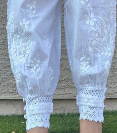 Beautiful Lucknow Chikankari ankle length Afghani  pants to give you a stylish look with your Lucknowi Kurtis or ethnic Kurtis.These pants have elastic  on the waist and dori to tie in the front. Attractive lace at the bottom. One size pant that's fits S ,M,L sizes. Fits ( US 4-6 to US 10-12sizes) Traditional Embroidered Ankle-length Bottoms, Traditional White Bottoms, Traditional White Long Pants, White Ankle-length Harem Pants, Traditional Wide Leg Bottoms With Chikankari Embroidery, Traditional Wide-leg Bottoms With Chikankari Embroidery, Traditional Trousers For Eid, Traditional White Straight Pants, Traditional White Trousers