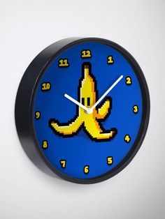 a clock that has an image of a banana on it's face and hands