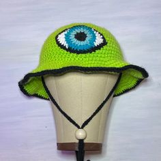 These unique bucket hats are perfect for any occasion! Winter Vacation Bucket Hat, Trendy Winter Bucket Hat For Vacation, Winter Vacation Bucket Hat With Short Brim, Trendy Green Bucket Hat For Vacation, Trendy Festival Bucket Hat One Size, Winter Bucket Hat For Vacation, Trendy Brimmed Hats For Festivals, Trendy Brimmed Festival Hats, Casual Brimmed Mini Hats For Outdoor