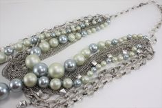 "Vintage Pearl Necklace Multi Strand Statement Gray Silver Layered Bridal Wedding Jewelry. I have mixed a vintage light gray/silver pearl beaded multi strand necklace with vintage and new silver chain necklaces and a vintage crystal necklace for some added sparkle. This necklace has a drop of 17\". It is a classic you will wear again and again! It would be great for a Mother's Day gift or a gift for yourself! International buyers welcome just contact me first for shipping charges." Silver Multi-strand Pearl Necklace, Vintage Silver Pearl Necklace For Party, Silver Multi-strand Pearl Necklace For Party, Multi Strand Beaded Necklace, Pearl Necklace Vintage, Wedding Bridal Jewellery, Vintage Pearls, Vintage Crystal, Multi Strand Necklace