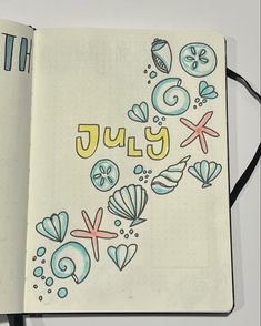 an open notebook with the word july written in it