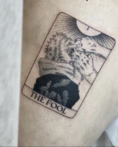 the fool tarot card tattoo on the thigh