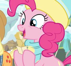 the pinkie is looking at something in her hand