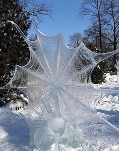 an ice sculpture is shown in the snow