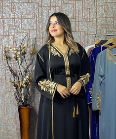 Traditional Black V-neck Abaya, Black Long Kaftan With Intricate Embroidery, Black Kaftan For Eid And Traditional Ceremonies, Embroidered Black Kaftan For Traditional Ceremonies, Traditional Black Festive Kimono, Festive Black Kaftan With Gold Embroidery, Traditional V-neck Black Abaya, Black Kaftan With Intricate Embroidery For Festivals, Elegant Black Kaftan For Festivals