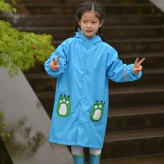 Stay Dry and Play On with Our Kids Waterproof Raincoat Jumpsuit Introducing the perfect rain gear for your little adventurers - the Kids Waterproof Raincoat Jumpsuit! Designed to keep children dry and comfortable, this raincoat is ideal for all their outdoor activities, whether it's a walk to school, a weekend hiking trip, or a fun playdate in the rain. Made from durable nylon, it offers excellent protection against the elements, ensuring your child remains cozy and dry no matter the weather. Av Playful Waterproof Raincoat For Rainy Weather, Playful Winter Raincoat For Playtime, Playful Winter Playtime Raincoat, Playful Raincoat For Rainy Season, Playful Hooded Outerwear For Outdoor Activities, Playful Winter Raincoat, Hooded Winter Adventure Raincoat, Winter Adventure Hooded Raincoat, Playful Hooded Raincoat For Rainy Weather