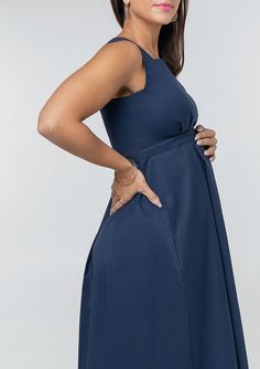 SHIPS MARCH 16! We think our Into the Blue Maternity Dresses are our best maternity work clothes creation to date. This luxury maternity blue dress has breastfeeding access, thanks to our designer breastfeeding panel. It's a chic, flattering style for the office, and a nice change from black. Made with Sustainable Italian fabric, this gorgeous piece is formal enough for the most professional occasion, with the femininity of a black tie party dress. Washable, petite friendly, perfect for travel, Black Tie Party Dress, Postpartum Dresses, Feeding Dresses, Maternity Work Wear, Blue Maternity Dress, Maternity Nursing Clothes, Maternity Work Clothes, Petite Models, Feminine Skirt