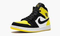 The Air Jordan 1 Mid “Yellow Toe” is a fresh look for the classic mid-top edition of the Jordan 1.  The design follows the popular color block blueprint of models like the “Bred Toe” Jordan 1 High, but with vibrant yellow accents to go along with the black and white base.  The construction features a blend of leather and synthetic nubuck across the upper with the standard Jordan 1 sole unit below.  The design is completed with a Jumpman logo tongue tag.  The Air Jordan 1 Mid “Yellow Toe” release Air Jordan 1 Mid Se, Jordan 11 Retro Low, Jordan 8, Air Jordan 12 Retro, Jordan 12 Retro, Jordan 11 Retro, Yellow Accents, Air Jordan 11, Popular Color