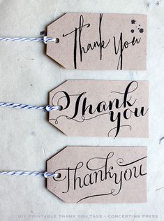 three tags that say thank you, thank you and thank you with string attached to them