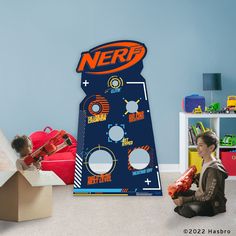 a kid playing with a nerf game in his room