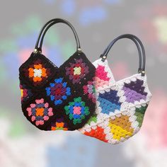 Crochet Granny Square Tote Bag with  Fabric Liner Both bags measure with a 9 inch strap drop, 12.5 inches wide, & 10 inches deep.  Bags come with snap-on straps made of PU leather. The multicolored bag with black edging comes with black straps and is lined in sugar skull fabric. The rainbow colored bag with white edging comes with navy blue straps and is lined with pink & white speckled/plaid fabric.   *This is an actual bag, ready to ship, not just the pattern. Multicolor Crochet Shoulder Bag With Adjustable Strap, Multicolor Hobo Bag With Detachable Handle For Shopping, Colorful Bucket Bag For Daily Use, Retro Multicolor Hobo Shoulder Bag, Multicolor Crochet Tote Bag With Adjustable Strap, Square Multicolor Hobo Bag For Daily Use, Multicolor Square Bag With Adjustable Strap, Multicolor Square Hobo Bag For Daily Use, Retro Multicolor Hobo Tote Bag