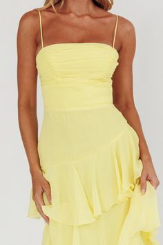 Back in stock! Our Parisian Summer Yellow Tiered Maxi Dress is the perfect wedding guest dress or sorority formal dress! Featuring a ruched bodice, spaghetti straps and a playful asymmetrical tiered skirt. Zipper back. Brunch Dress With Fitted Bodice And Spaghetti Straps, Fitted Bodice Dress With Spaghetti Straps For Brunch, Brunch Dress With Spaghetti Straps And Fitted Bodice, Spaghetti Strap Dress With Fitted Bodice For Brunch, Summer Prom Strapless Dress With Ruched Bodice, Summer Mini Dress With Sweetheart Neckline And Ruffled Skirt, Chiffon Mini Dress With Spaghetti Straps For Brunch, Summer Bridesmaid Mini Dress With Ruched Bodice, Spaghetti Strap Dress With Ruched Bodice For Brunch