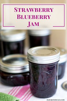 blueberry jam in a mason jar with the words strawberry blueberry jam above it