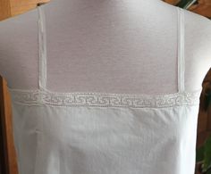 Antique French handmade white cotton chemise with a pretty embroidered detail to the front. It is in good condition. There is no size label as it is handmade. Please check the measurements below to ensure fit. Laid flat and measured side to side. Armpit to armpit: 49cm - 19.3 inches Top of shoulder to hem: 91cm - 35.8 inches Across Hem: 71.5cm - 28 inches Women's Nightgowns, French Linen, Nightgowns, Size Label, Vintage French, French Antiques, Night Dress, French Vintage, Night Gown