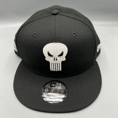 Marvel The Punisher Hat Men Black 9fifty New Era Snap Back Cap New Snapback Hat For Fan Gear With Flat Brim, Black Fitted Hat With Short Brim For Outdoor, Black Baseball Cap With Flat Crown For Fans, Black Flat Brim Snapback Hat For Baseball Season, Urban Black Baseball Cap With Flat Crown, Black Snapback Baseball Cap, Black Flat Crown Baseball Cap For Fans, Black Fitted Hat With Flat Crown For Sports, Black Fitted Hat With Flat Crown For Fans