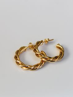 14k gold filled hoops twisted design Approximately 1” A perfect everyday size! Twisted Gold Hoop Earrings, Modern Twist Gold Plated Twisted Jewelry, Twisted Yellow Gold Hoop Earrings For Everyday, Everyday Twisted Yellow Gold Hoop Earrings, Everyday Twisted Yellow Gold Jewelry, Twisted Yellow Gold Jewelry For Everyday, Everyday Yellow Gold Twisted Hoop Earrings, Everyday Jewelry With Modern Twisted Style, Everyday Twisted Modern Jewelry