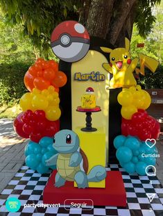 a pokemon themed birthday party with balloons and decorations