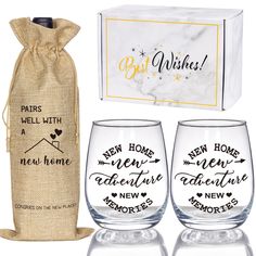 two wine glasses and a gift bag with the words new home, new adventure written on them