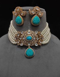 Turquoise Kundan Choker Necklace, a tribute to Sabyasachi's style. This Polki Choker and Jadau Jewelry ensemble exudes opulence, showcasing the allure of Kundan Bridal Jewelry. The Kundan Choker Set celebrates tradition and artistry, reflecting regal charm. Indulge in the resplendent beauty of this jewelry set, where every piece captures the essence of Kundan and Polki craftsmanship, creating a captivating blend of elegance and cultural richness.this necklace will match your al outfits  Perfect Traditional Turquoise Bridal Necklace As A Gift, Turquoise Kundan Bridal Necklace For Festive Occasion, Festive Turquoise Kundan Bridal Necklace, Traditional Turquoise Necklace For Celebration, Turquoise Kundan Necklace With Meenakari Detailing, Turquoise Kundan Necklace Temple Jewelry Gift, Traditional Kundan Necklace In Turquoise, Turquoise Kundan Necklace For Festivals, Traditional Turquoise Kundan Necklace As Gift