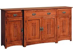 a wooden sideboard with two doors and drawers