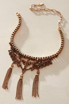 Finish off your look with this eye-catching choker, featuring gemstone detailing and dangling tassels with a lobster clasp closure. | Eloise Choker by Free People in Gold Elegant Metal Tassel Necklace For Parties, Metal Tassel Necklace For Party, Party Necklaces With Tassels, Fringe Tassel Necklace For Party, Chic Tassel Necklace For Party, Elegant Tassel Necklace With Fringe For Party, Gold Topaz, Choker Collar, Silver Crystal