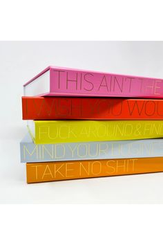 four books stacked on top of each other