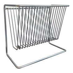 a metal magazine rack on a white background