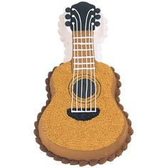 a cake shaped like an acoustic guitar