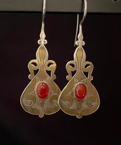 The silver is about 90% and it is gold gilded on top of silver The stone is Carnelian Size: 2.35  inch long and 21mm wide Antique Hallmarked Earrings For Festive Occasion, Red Earrings With Intricate Design For Ceremonial Occasions, Gold Bohemian Carnelian Earrings, Bohemian Gold Carnelian Earrings, Elegant Silver Carnelian Earrings, Bohemian Hallmarked Drop Earrings, Artisan Gold Carnelian Jewelry, Artisan Carnelian Gold Jewelry, Silver Carnelian Drop Earrings