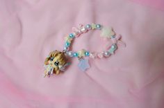 Let everyone see just how magical you are with the cutest coordinate you can dream of!  This is a handmade Symphogear inspired charm bracelet using an authentic Serena figurine turned charm straight from Japan! While this is a new bracelet using new beads and cord, the charm itself is second hand. Please buy knowing there may be some scuffs, chips, and general aging on the charm itself. However, all charms have been disinfected and cleaned to the best of my ability and are happy to serve a new l Kandi Ideas, Bracelet Keychain, New Bracelet, Kandi Bracelets, Cute Bracelets, Japanese Fashion, Arm Band, Jewelry Bracelets, Second Hand