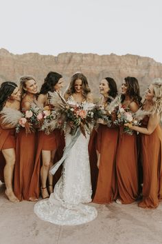 a group of women standing next to each other