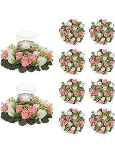 pink roses and greenery are arranged around a candle holder