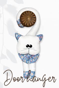 a white cat with a blue flowered bow tie and the words door hanger on it