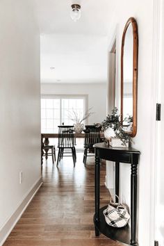 the hallway is clean and ready for us to use as an entrance way in this home