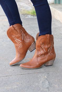 From Very Volatile, the 'Markie' western cowgirl boot / bootie is a must have! Tan in color with light brown stitching and gold rand on the heel. These are perfect for wearing with jeans, dresses, or shorts! Heel measures about 2" at highest point. Pull on. Very comfortable! Model is wearing size 8, which is her true size. Fall Boots With Stacked Heel For Western-themed Events, Stacked Heel Boots For Western-themed Fall Events, Western Ankle Heeled Boots For Fall, Fall Ankle Boots For Western-themed Events, Western Style Ankle Boots For Fall, Western Style Ankle Heeled Boots For Fall, Fall Rodeo Heeled Boots With Round Toe, Fall Round Toe Heeled Boots For Rodeo, Round Toe Heeled Boots For Rodeo In Fall