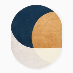 a round rug with two different colors on it