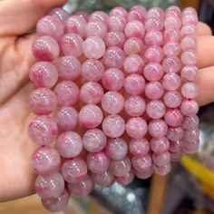 Material:pink rhodonite beads size :7-12.5mm quantity: one strand 6mm approx 29 pcs one strands 7mm approx25 pcs one strands 8mm approx 22 pcs one strands 9mm approx 21pcs one strands 10mm approx 19 pcs one strands 11mm approx 18pcs one strands 12mm approx 16 pcs one strands 13mm approx 16 pcs one strands 14mm approx 15 pcs one strands 15mm approx 14pcs one strands 16mm approx 14 pcs one strands 17mm approx 13pcs one strands 18mm approx 13pcs one strands 19mm approx 12pcs one strands 20mm approx Pink Round Beads Crystal Bracelet For Spiritual, Pink Round Beads Crystal Bracelet Spiritual, Pink Round Spiritual Beaded Bracelets, Pink Crystal Bracelet With Gemstone Beads For Healing, Pink Spiritual Crystal Bracelet With Round Beads, Pink Gemstone Beads Bracelets, Pink Gemstone Beads Bracelets With Round Beads, Pink Hand-strung Crystal Bracelet, Pink Gemstone Beads Bracelet