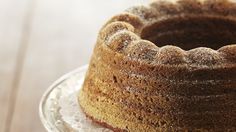 a bundt cake sitting on top of a glass plate