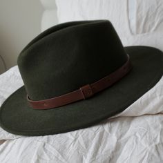 Worn Once, Looks Brand New! Classic Green Everyday Hat, Classic Green Felt Hat For Fall, Classic Green Hat For Fall, Wide Brim Wool Fedora, Solid Wide Brim Wool Fedora, Brixton Hat Women, Black Wool Fedora With Curved Brim, Black Leather Hat, Rugged Leather Wide-brim Fedora