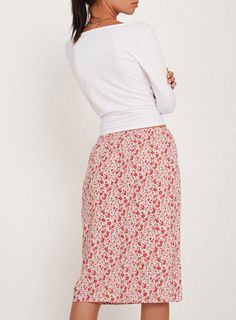 Rujina skirt features a loose, midi hem and an elasticated waistline with tie fastenings for an adjustable fit. Complete with a repeat floral print. Pair it with the Rolia Top. About Rujina Skirt In Ditsy Floral Blush Red Knee length midi skirt Elasticated waistband Pink tie at front Ivory with blush and red ditsy all over floral print Non stretch light weight viscose 100% viscose Motel is a trendy and fashion-forward women's contemporary clothing brand that offers a wide range of stylish and un Summer Viscose Skirted Bottoms, Summer Skirted Bottoms In Viscose, Red Gathered Skirt For Spring, Red Skirt With Elastic Waistband For Spring, Spring Daywear Rayon Maxi Skirt, Rayon Midi Skirt With Floral Print, Spring Tiered Viscose Maxi Skirt, Casual Midi Length Floral Print Bottoms, Spring Casual Viscose Maxi Skirt