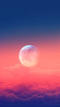 the moon is seen above the clouds in this pink and blue sunset photo taken from an airplane