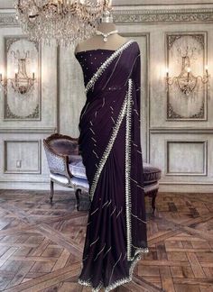 Beautiful deep purple satin georgette saree with mirror work and running blouse piece. Purple Embellished Pre-draped Saree, Embellished Purple Pre-draped Saree, Elegant Purple Pre-draped Saree, Purple Embellished Georgette Pre-draped Saree, Purple Georgette Pre-draped Saree For Festivals, Pre-draped Purple Saree With Mirror Work, Purple Pre-draped Saree With Mirror Work For Navratri, Navratri Purple Pre-draped Saree With Mirror Work, Semi-stitched Purple Pre-draped Saree With Mirror Work